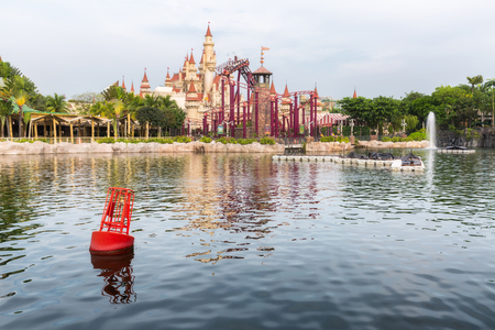 SINGAPORE - NOV 18: Beautiful castle and roller coaster in Universal Studios, Sentosa Island, Singaporeのeditorial素材