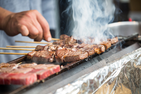 Japanese barbecue grill on skewers, street food in Japan