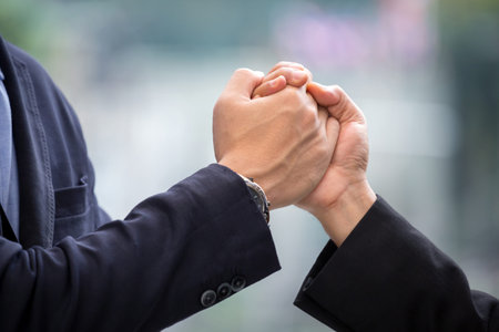 Business man handshake of teamwork or tag team in meeting