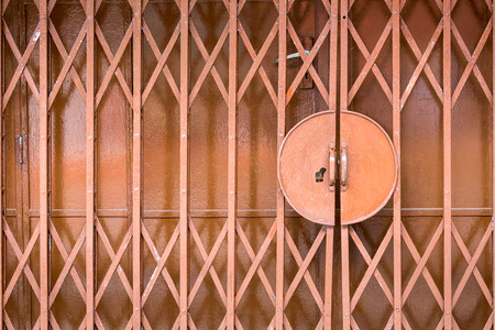 Old brown metal door background grunge styleの写真素材