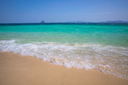 Tropical beach with sea sand and blue sky at day time in summer, Phuket, Thailandの写真素材