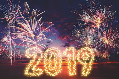 New year 2019 concept, Firework with sky and beach at sunsetの写真素材