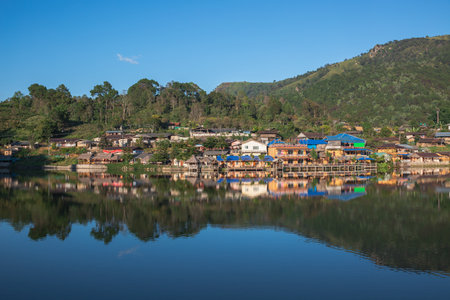 Landscape of Ban Rak Thai village with lake in morning at Mae Hong Son, Thailandの写真素材