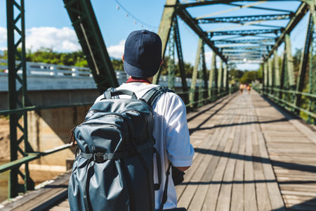 Solo travel relax vacation concept, Young happy asian traveler and photographer man with camera and...