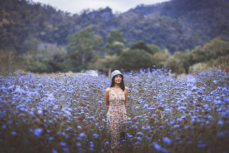 Winter travel relax vacation concept, Young happy traveler asian woman with dress sightseeing on...