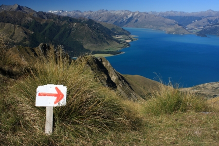 red arrow marker showing direction above lake Hawea, New Zealandの写真素材