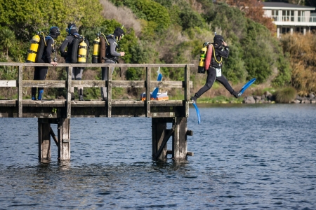 scuba divers on lake Pupuke, New Zealandの写真素材