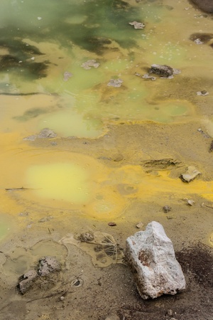 mud pool with sulphur sediments in Waiotapuの写真素材