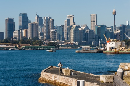 man fishing in Darling Harbourのeditorial素材