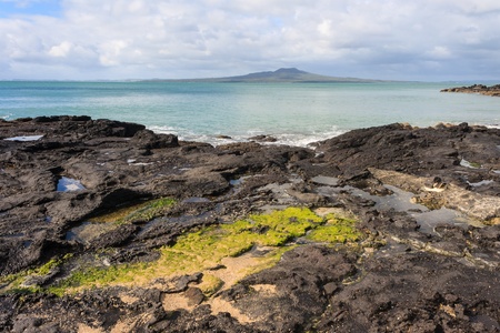 volcanic rocks on North Shore coastの写真素材