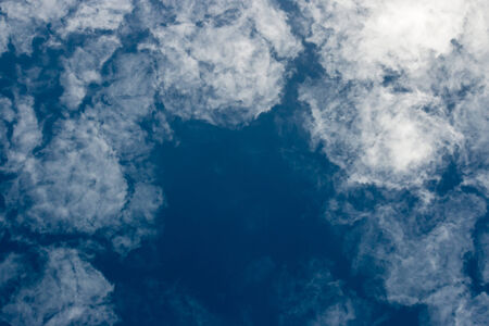 cloud formation against blue skyの写真素材