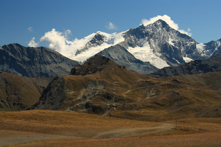 snow covered peaks in Swiss Alpsの写真素材