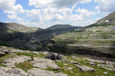 tent above glacial valley in Ordesa National Parkの写真素材