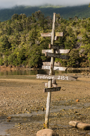 wooden pole with directionsの写真素材