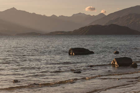 sunset over lake Wanaka, New Zealandの写真素材