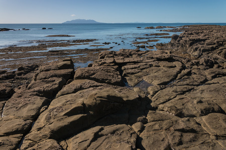 volcanic boulders at Omaha Bay, New Zealandの写真素材