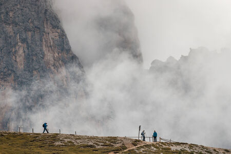 hikers on walking track in Dolomitesの写真素材
