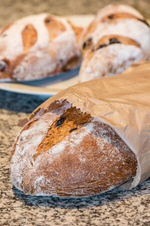 artisan bread in paper bagの写真素材