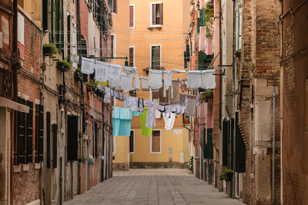 drying laundry in Venice streetの写真素材