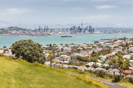 Auckland skyline and CBD with Devonport suburb in foreground, New Zealandの写真素材