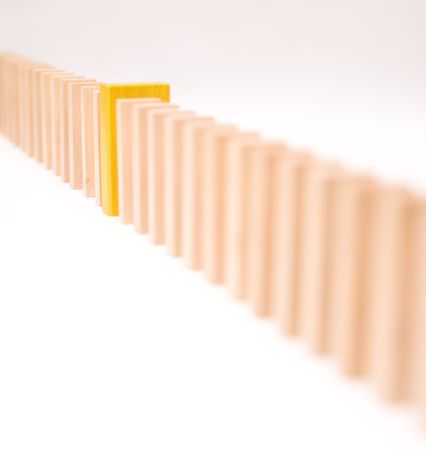 Queue of block with one yellow piece, conceptual imageの写真素材