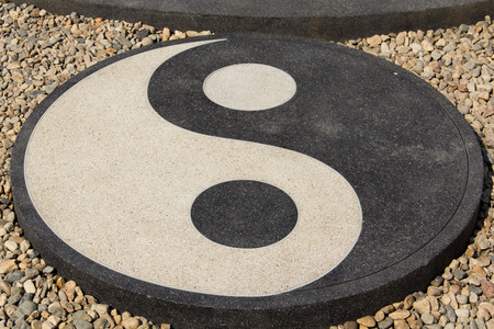 Yin Yang circle on the gardenの写真素材