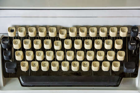 Old typewriter keyboard that we used to type in the pastの写真素材