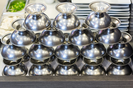 Stainless ice cream cup that arrange in the restaurantの写真素材