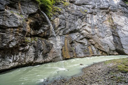 swiss river aare gorge in haslital bern mystical dark scenic narow foodpath switzerlandの写真素材