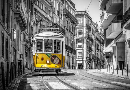 yellow tram line 28 black and white photography lisbon portugal