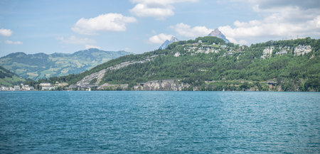 panoramic view at swiss alps on a boat cruise on lake lucerne switzerland