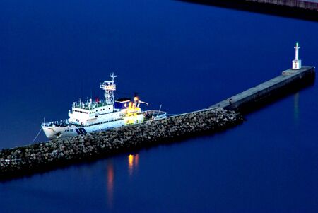 Boat at Port after Sunsetの写真素材
