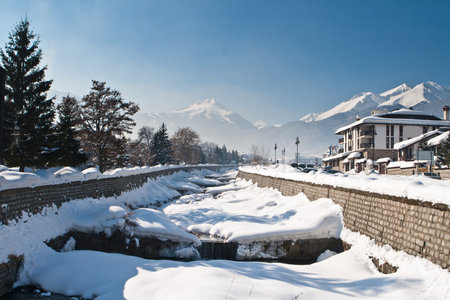 Mountain river  proceeding through a mounting skiing resort Bansko in Bulgariaの写真素材