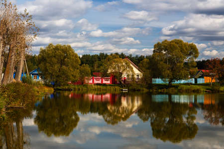 Pond in the middle of the small villageの写真素材