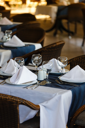 Table at restaurant served for reception of visitorsの写真素材