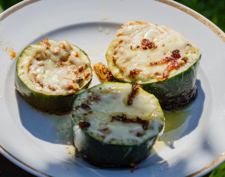 Julienne from mushrooms in a cocotte from zucchiniの写真素材