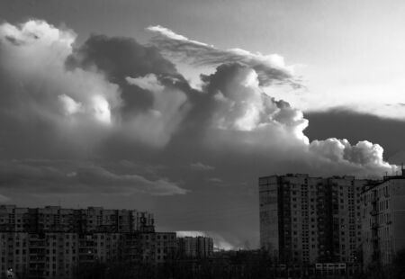 Cumulus clouds over the cityの写真素材