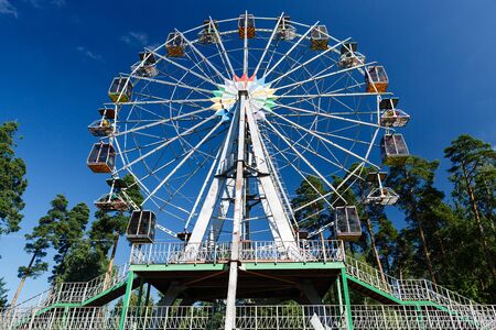 Old ferris wheel in the park of the provincial townの写真素材