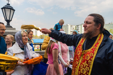 Moscow, Russia - April 27, 2019: Believing Muscovites consecrate in church Easter eggs and Easter...