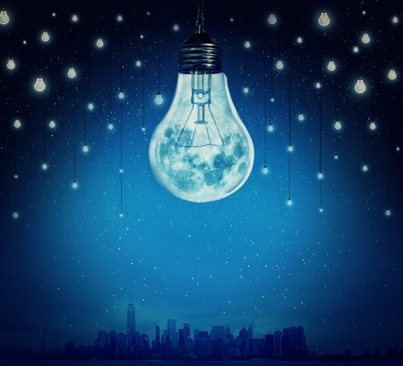 Moon and stars in shape of bulbs light over a city. Surreal background. Alternative energy conceptの写真素材