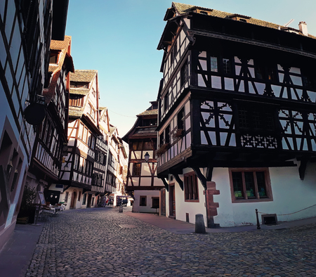 Strasbourg narrow streets of the old city with idyllic half timbered facades of medieval buildings. Beautiful architecture Petit France district, Alsace.の写真素材