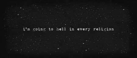 I'm going to hell in every religion. Sarcastic atheist text art illustration, typewriter font style. Minimalist lettering design and vintage dark paper texture background. Funny hipster print conceptの写真素材