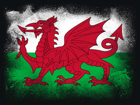 Wales Flag design composition of exploding powder and paint, isolated on a black background for copy space.の写真素材