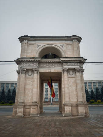 Close up view to the Triumphal Arch in front of the government building, Chisinau, Moldova. Historical landmarks of the capital cityの写真素材