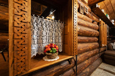 Interior of a wooden house in the village. Decoration of the house.の写真素材