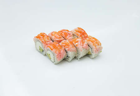 a portion of sushi rolls with sweet and sour sauce is on the white table, a dish of Asian cuisine from rice and seafood for eating in the restaurantの写真素材