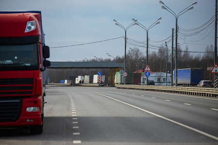 a long traffic jam of many trucks at the border, a long wait for customs checks between States due to the coronavirus epidemic, increased sanitary inspection of cargo transportの写真素材