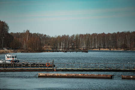 Wooden pier on the shore of the Volga river, Russiaの写真素材