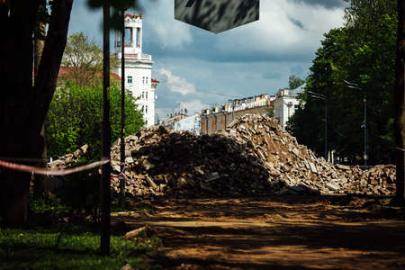 A pile of rubble on the street in the city. High quality photoの写真素材