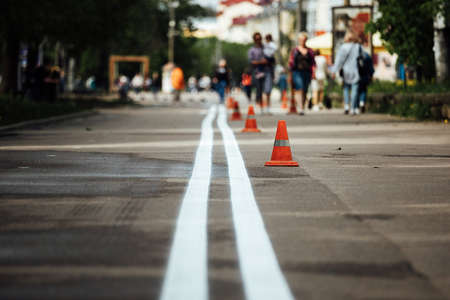 Traffic cones on the street. Traffic cones on the sidewalk.の写真素材